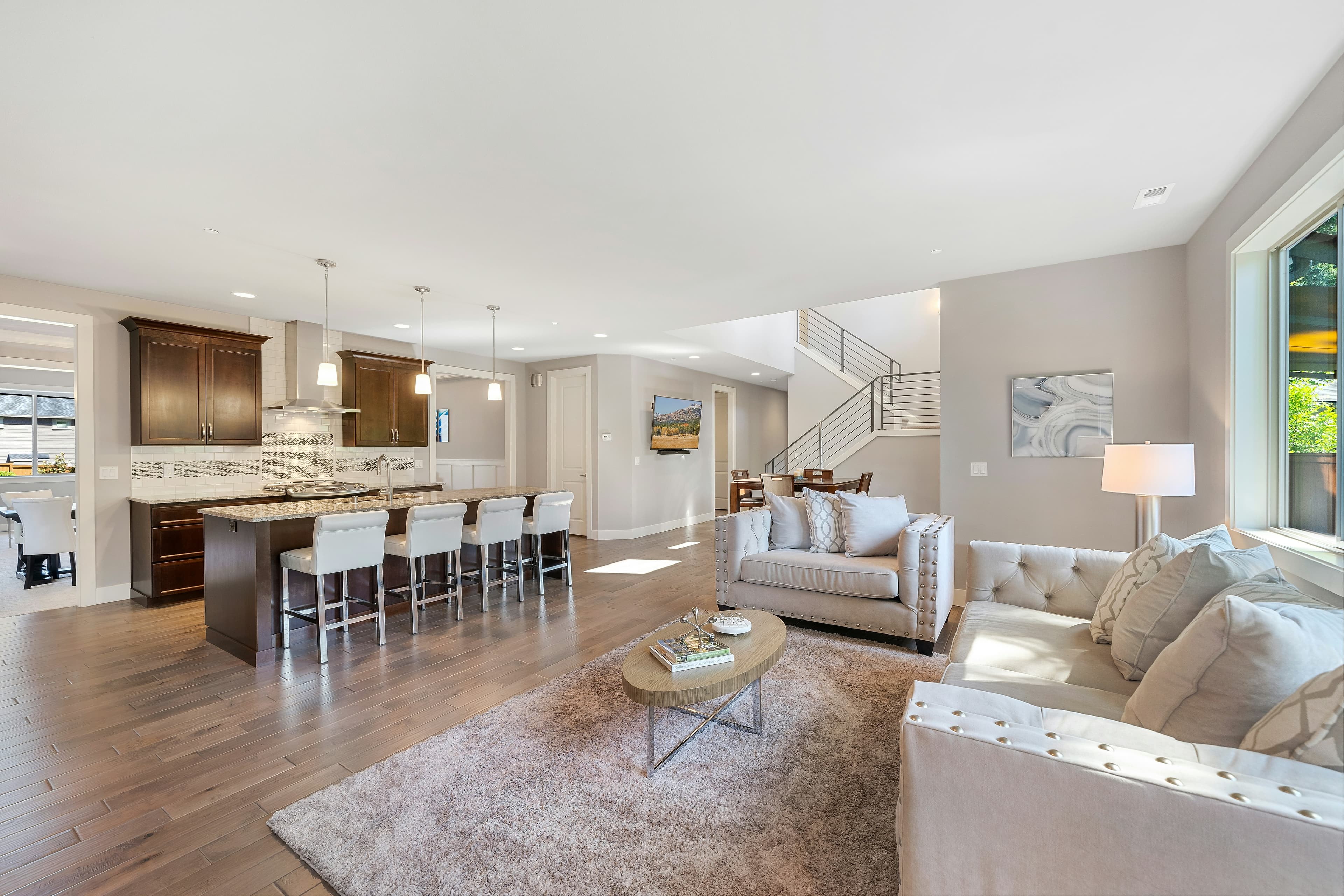 Open-concept living and kitchen with natural light