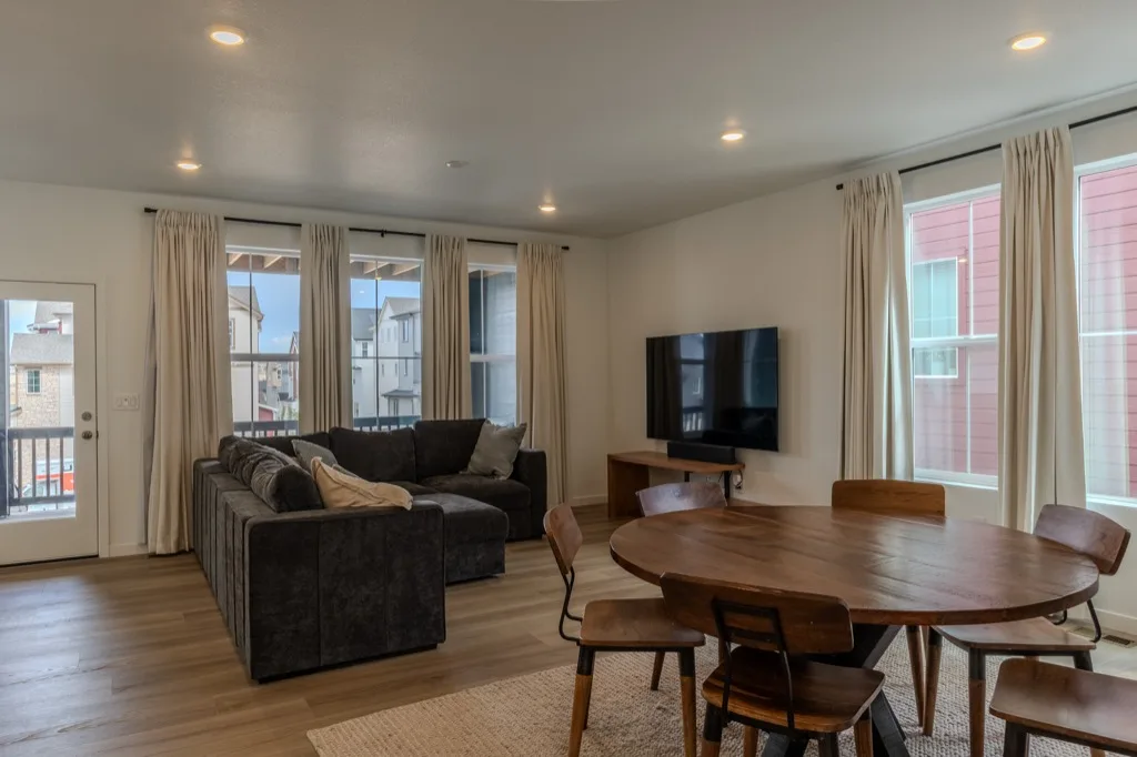 Open-concept living and dining room before virtual staging, with no table setting or decor